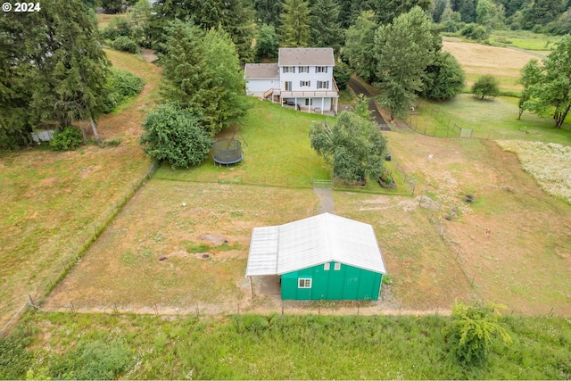 birds eye view of property with a rural view