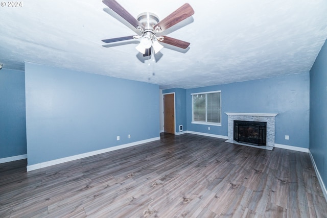 unfurnished living room with hardwood / wood-style floors