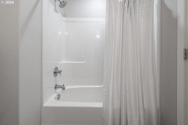 bathroom featuring shower / bath combo with shower curtain