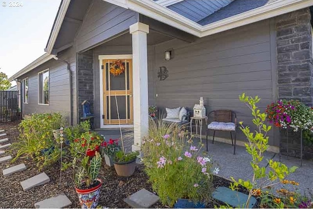 property entrance featuring a patio