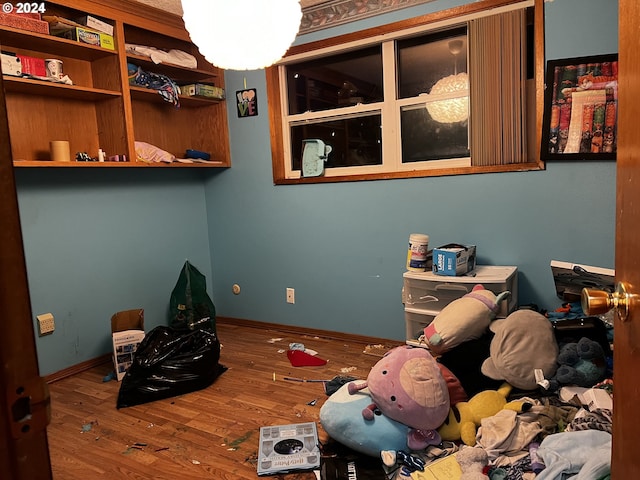 bedroom featuring hardwood / wood-style flooring