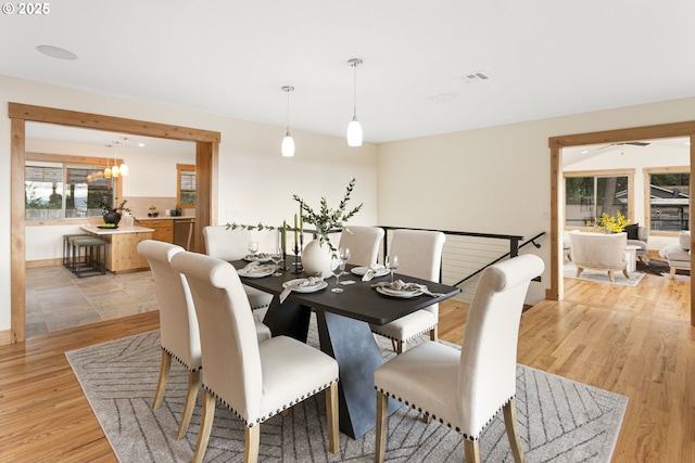 1017 Columbia Ridge Dr, Vancouver, WA 98664 - dining room with a chandelier and light wood-style flooring