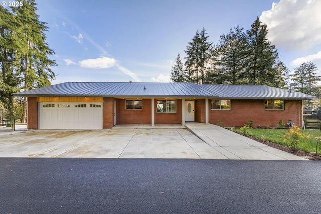 ranch-style home with a garage