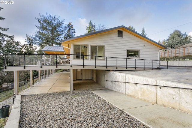 back of property with a patio