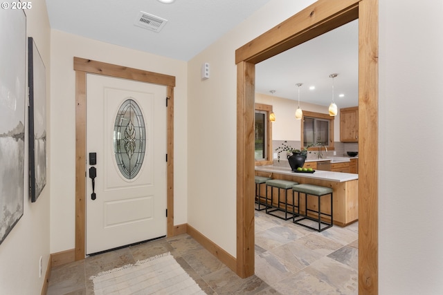 1017 Columbia Ridge Dr, Vancouver, WA 98664 - foyer with baseboards, light stone finish floors, and recessed lighting