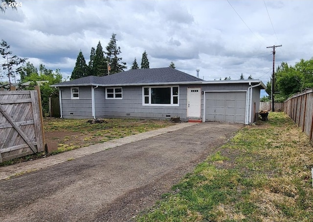 ranch-style home with a garage