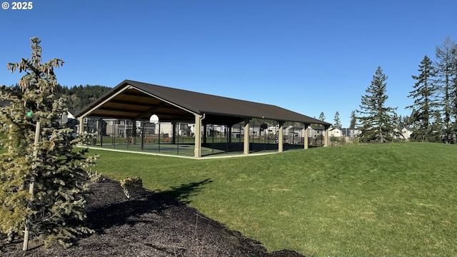 view of property's community with a yard and a gazebo