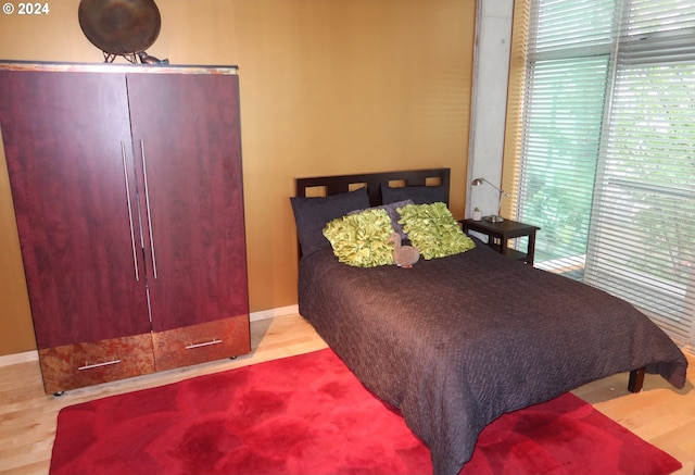 bedroom featuring light hardwood / wood-style floors