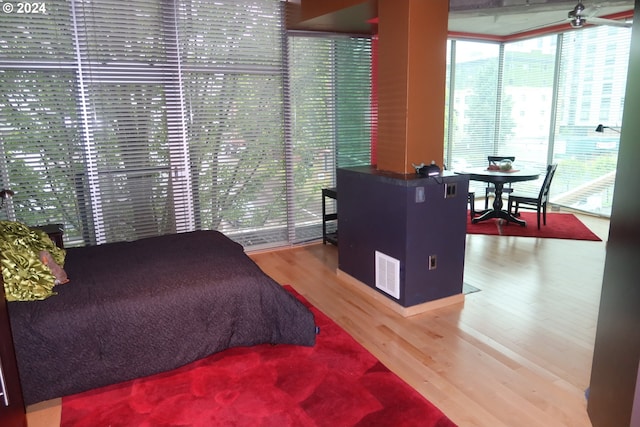 bedroom featuring wood-type flooring