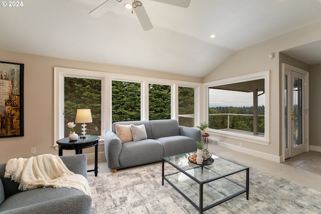 living room featuring recessed lighting, baseboards, light colored carpet, and vaulted ceiling