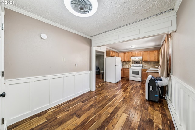 kitchen with dark wood-type flooring, tasteful backsplash, crown molding, a textured ceiling, and white appliances