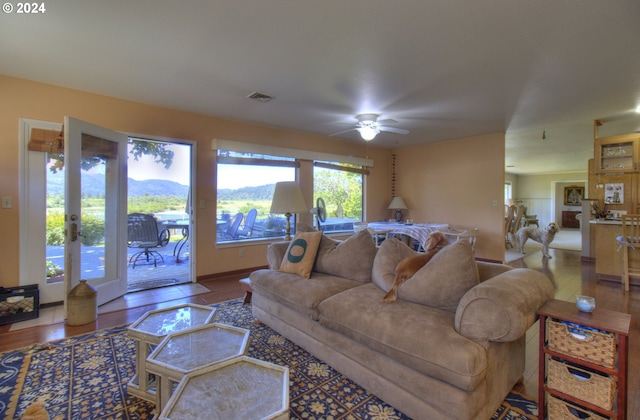 living room featuring ceiling fan