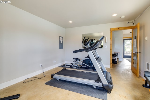 workout area featuring concrete flooring