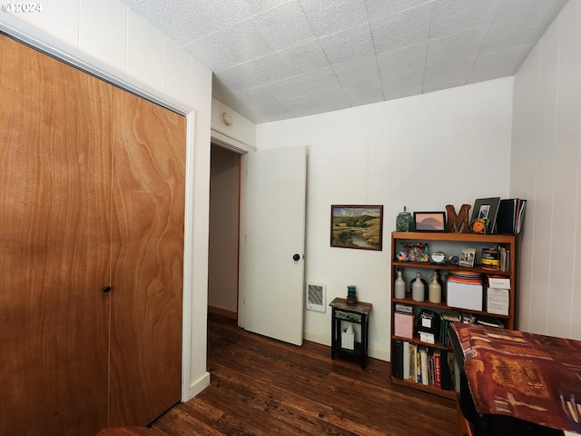 home office featuring wood finished floors and visible vents