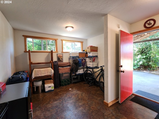 office area with a textured ceiling