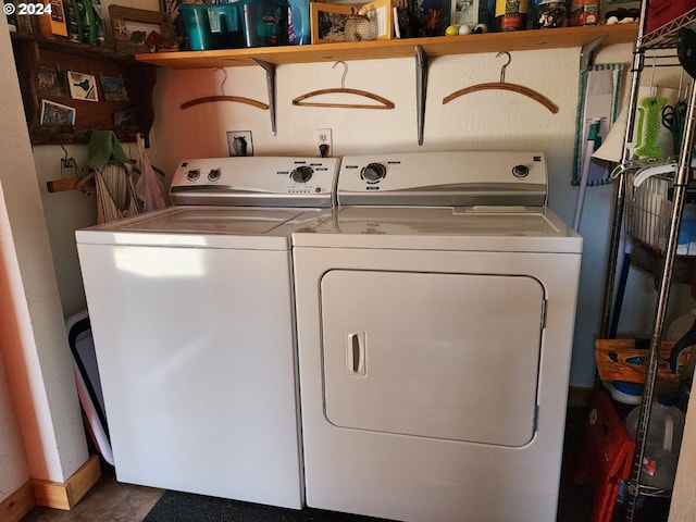washroom featuring laundry area and independent washer and dryer