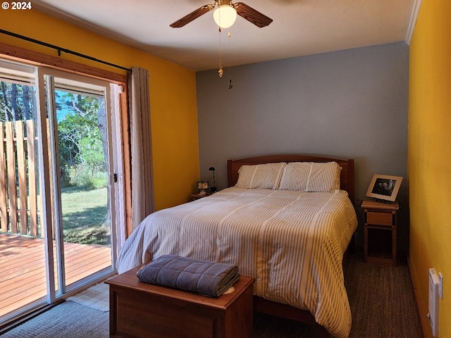 bedroom with access to outside and a ceiling fan