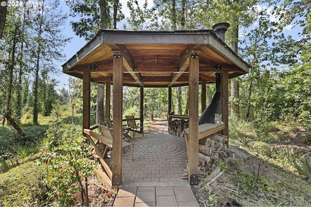 view of home's community with a patio area