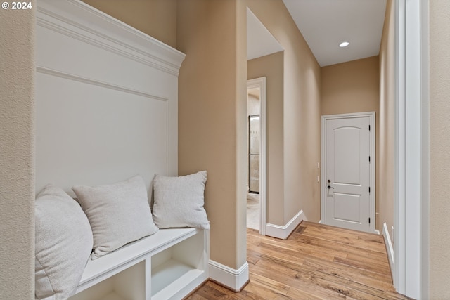 mudroom featuring wood-type flooring