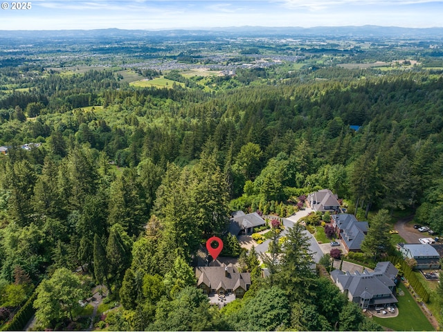 12320 NW Sargent Ln, Portland, OR 97231 - aerial view of property and surrounding area with a heavily wooded area