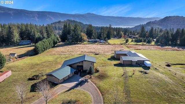 drone / aerial view featuring a mountain view