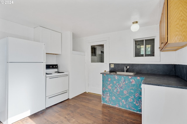 kitchen featuring dark hardwood / wood-style floors, decorative backsplash, sink, white cabinets, and white appliances