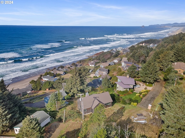 aerial view with a beach view and a water view