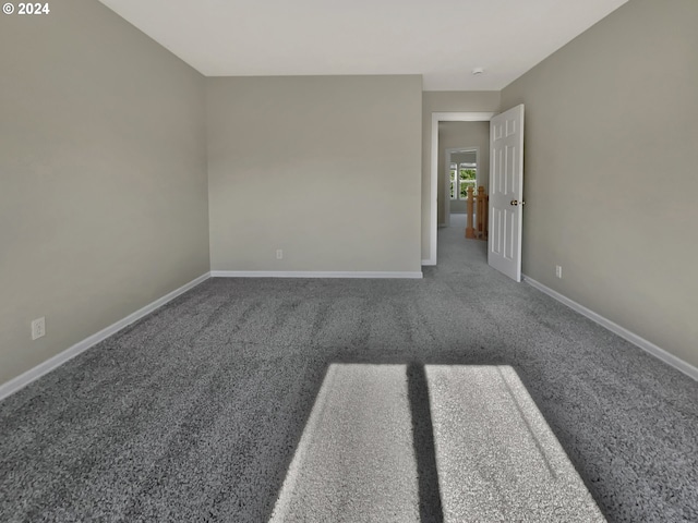 empty room featuring carpet flooring