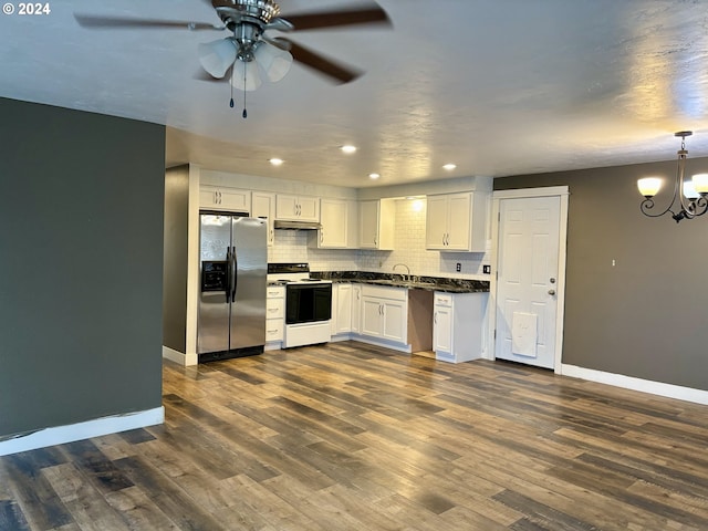 kitchen with white cabinetry, pendant lighting, dark wood-type flooring, and appliances with stainless steel finishes