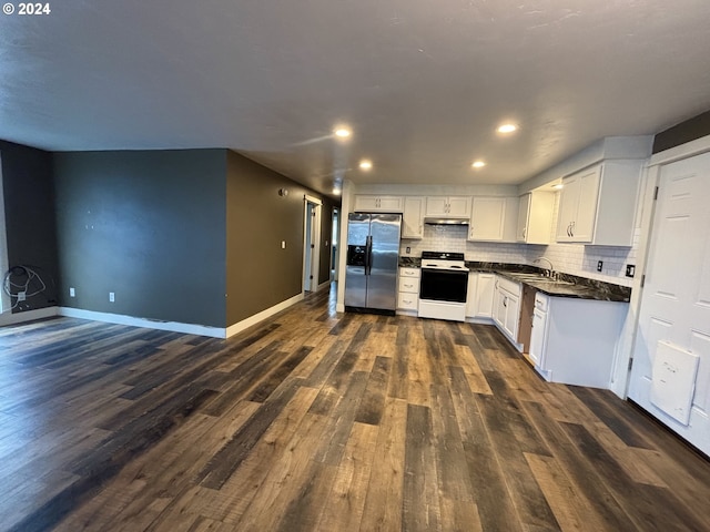 kitchen featuring stainless steel refrigerator with ice dispenser, dark hardwood / wood-style flooring, tasteful backsplash, white range, and white cabinets