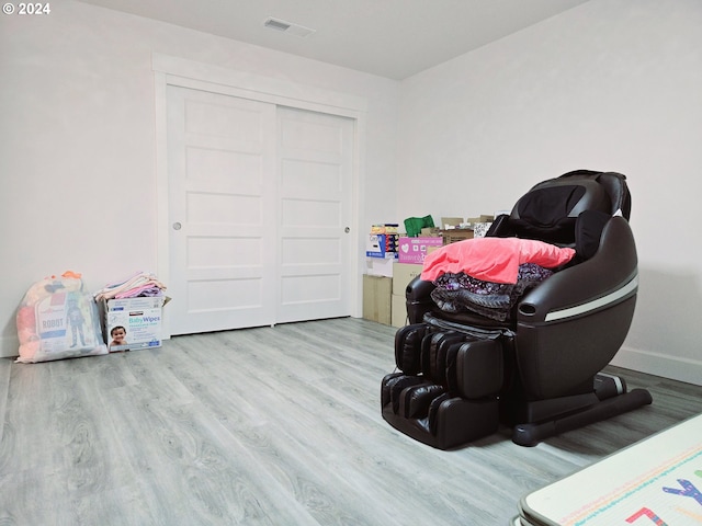 sitting room with light wood-type flooring