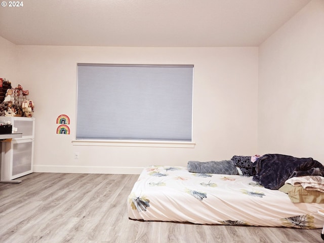 bedroom featuring light hardwood / wood-style floors