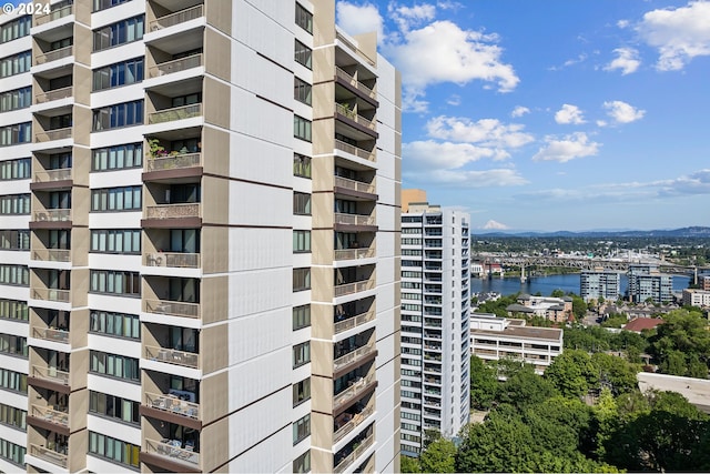 view of property with a water view