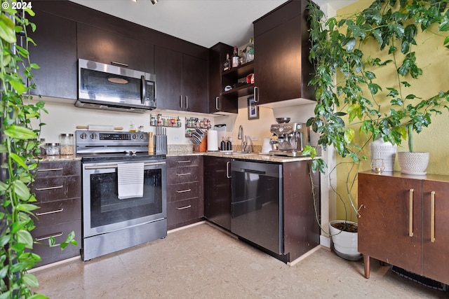 kitchen with dark brown cabinetry and appliances with stainless steel finishes