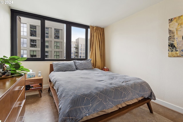 bedroom featuring multiple windows