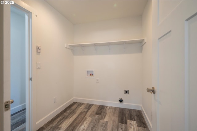 washroom with electric dryer hookup, hookup for a washing machine, and dark hardwood / wood-style floors