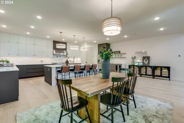 dining room featuring light hardwood / wood-style floors