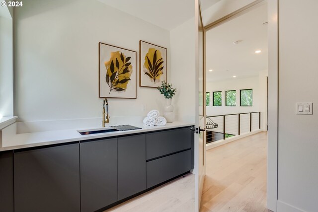 interior space with sink and light wood-type flooring