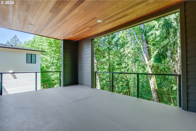 view of patio featuring a balcony