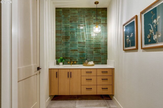 bathroom with vanity and tile patterned floors