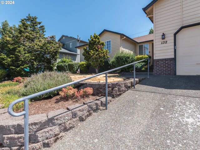 view of property exterior featuring a garage