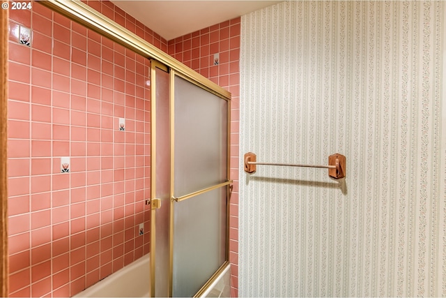 unfurnished bedroom featuring connected bathroom, a textured ceiling, and light colored carpet