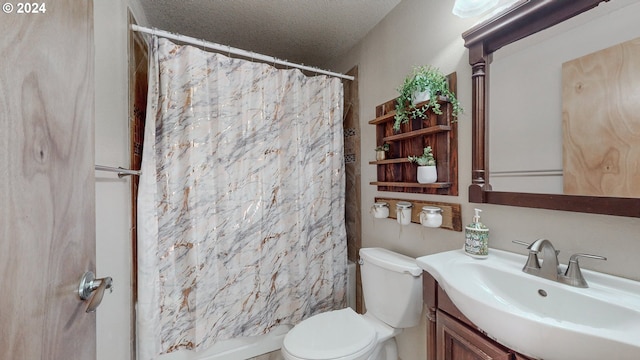 full bathroom featuring vanity, a textured ceiling, toilet, and shower / tub combo with curtain