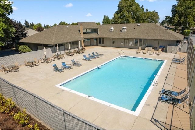 view of swimming pool with a patio area