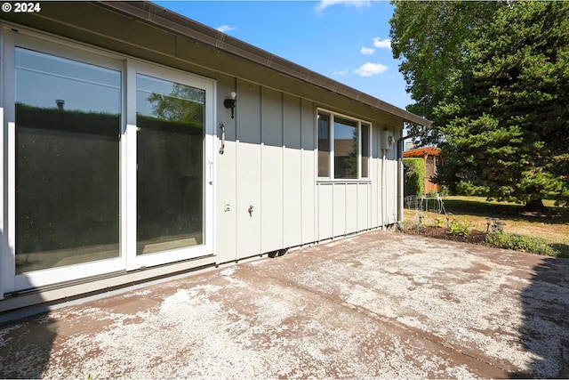 view of property exterior featuring a patio