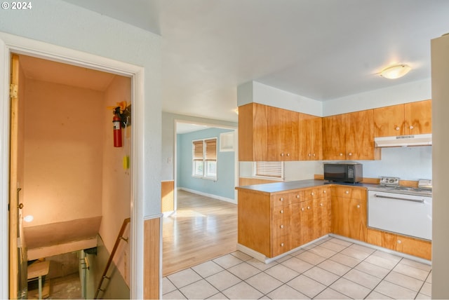 kitchen with light hardwood / wood-style flooring