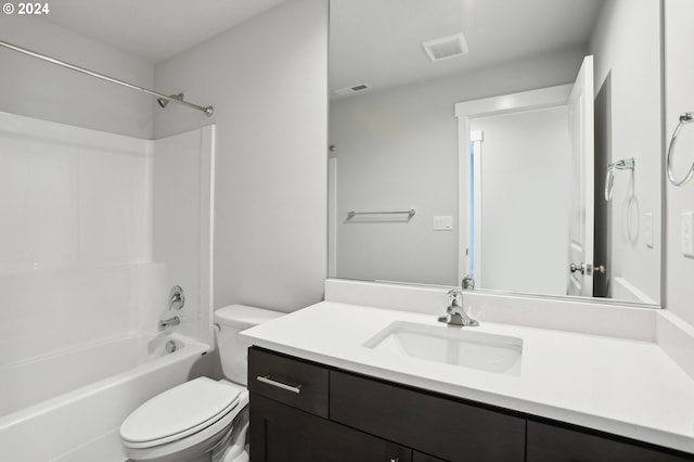 full bathroom featuring bathtub / shower combination, vanity, and toilet