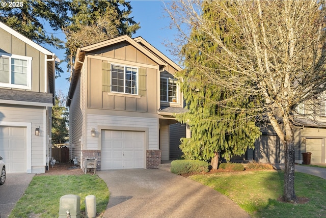 view of front of house featuring a garage and a front lawn