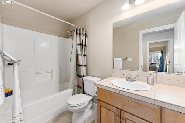 full bathroom with vanity, tile patterned floors, toilet, and shower / bathtub combination with curtain