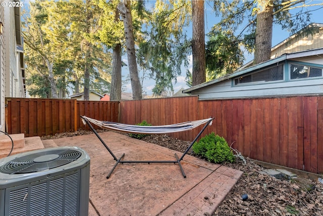 view of patio featuring central AC unit